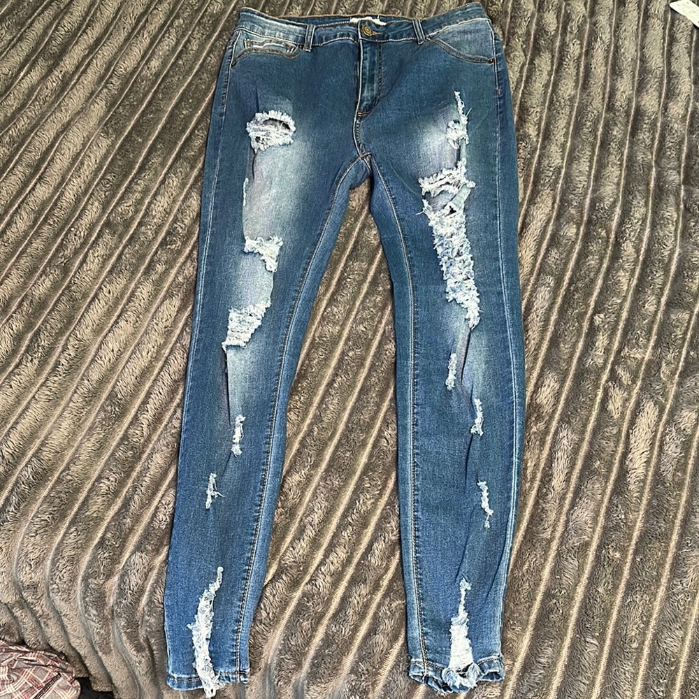 Distressed Blue Jeans